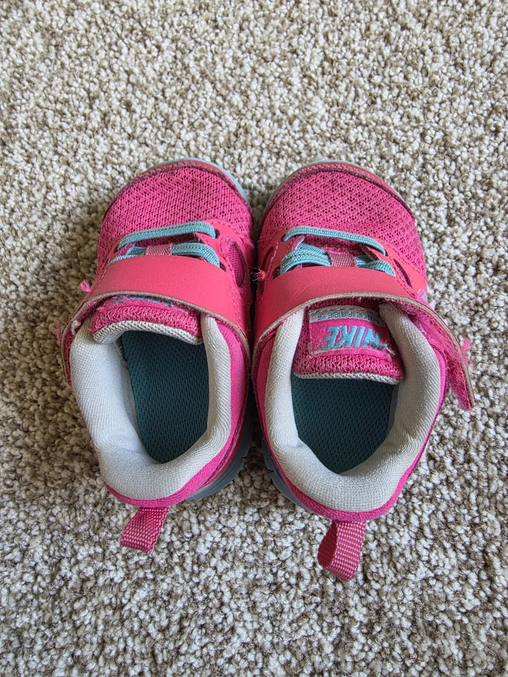 Nike Kids' Pink Athletic Sneakers with Teal Accents